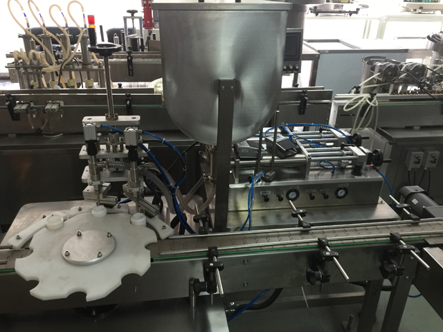 två burkar fyllningsmaskin.jpg