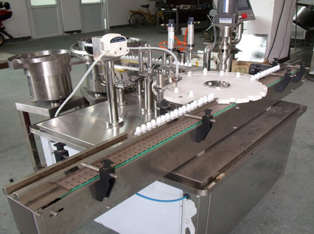 automatic rotary capping machine skruvlock maskin automatic.jpg