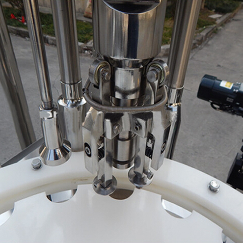 ropp capping heads for vial capper flaskor ROPP cappping equipment.jpg