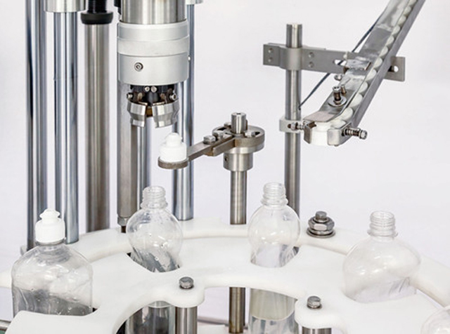 capping head close shot detaljer för singelkapningsmaskin.jpg