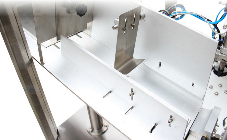 feeding control system tubes filler sealer matningskontroll med en baffle.jpg
