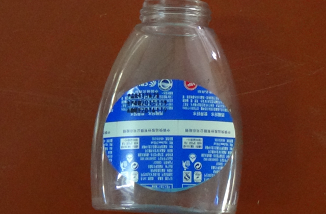 rullande etiketteringsmaskin för platta flaskor samples.jpg