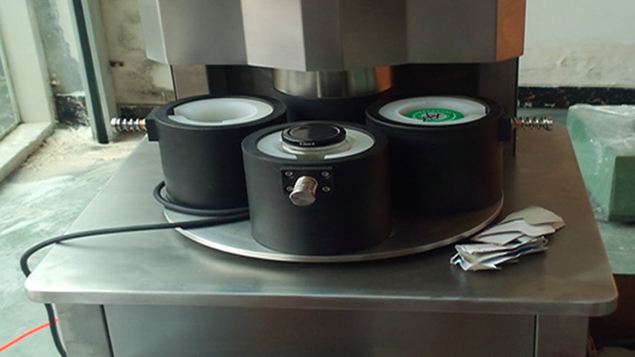 four heads vacuum capping machine semi automatic vakuumkapsel manual.jpg