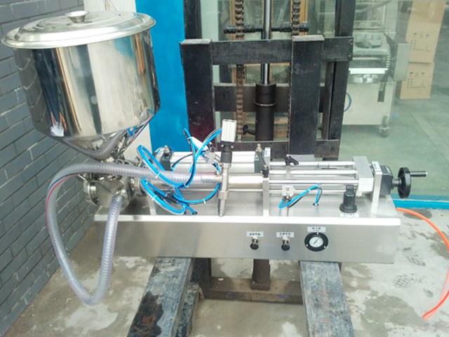 portable filling machine with handheld filling head fyllningsmaskiner utrustning semi automatic.jpg