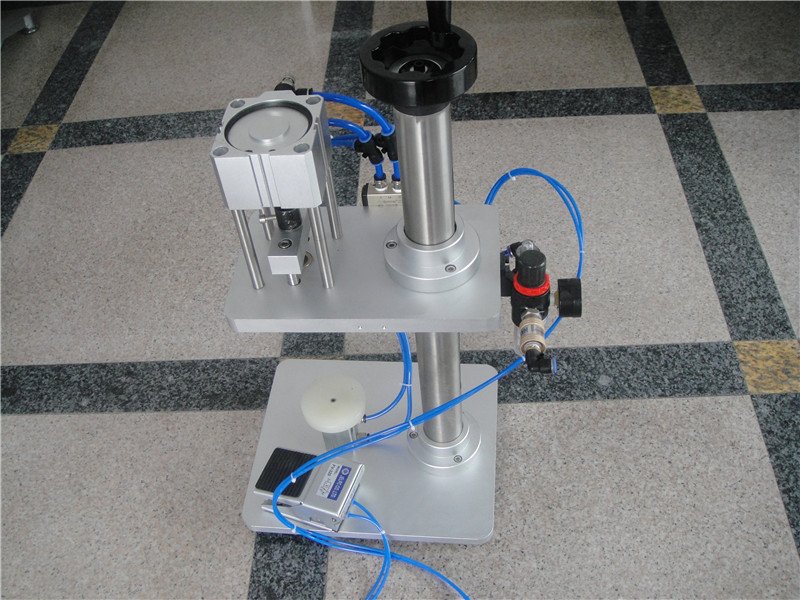 parfymflasklock crimping machine.jpg